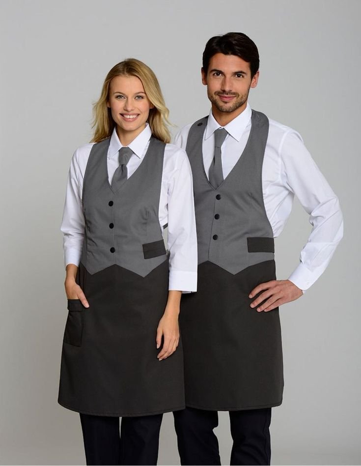 Businessman in navy blue formal suit and striped tie – Uniformcraft corporate uniform Dubai